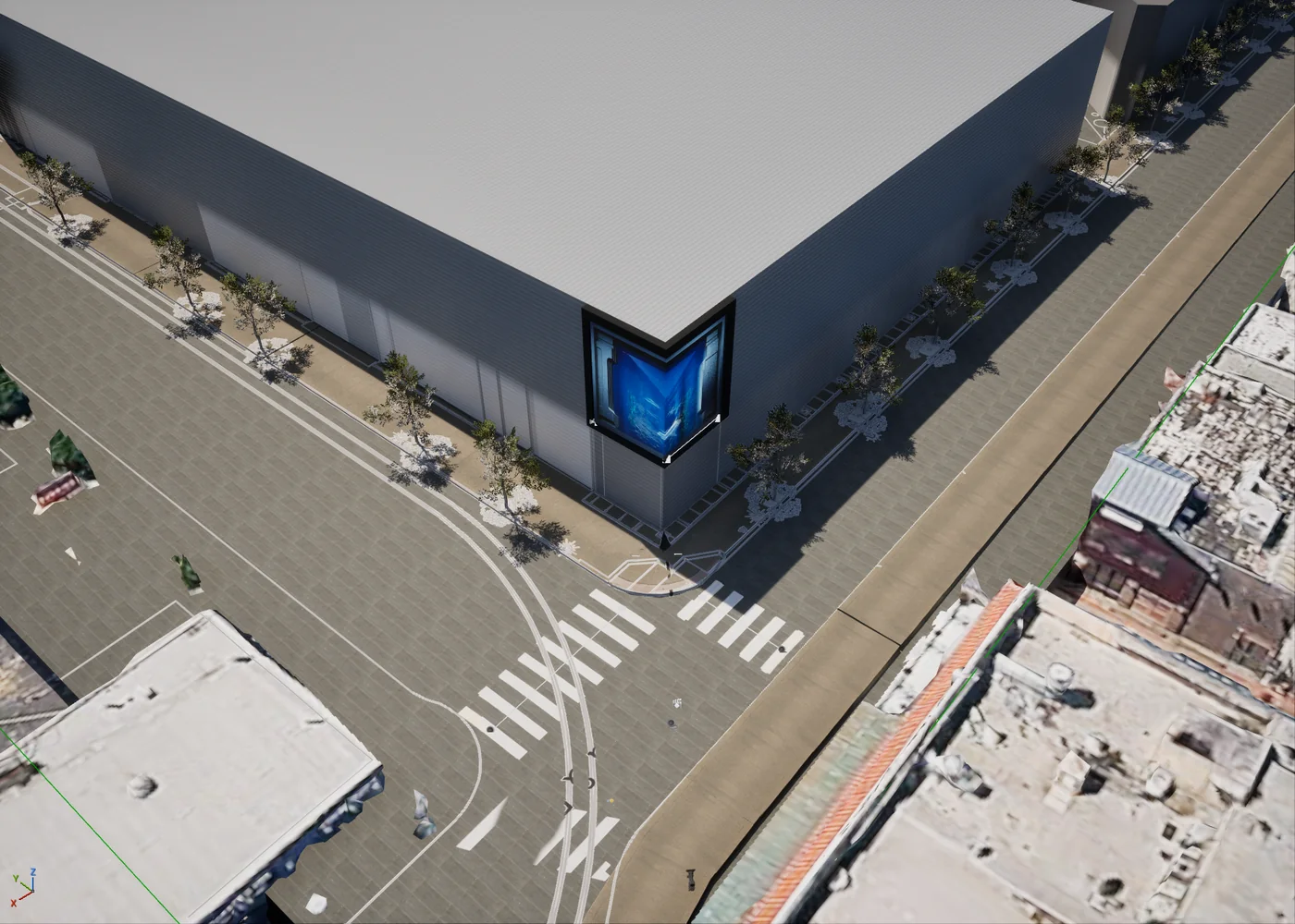 An aerial view of the Anchorage Square model in Unreal Engine, showing the building, the surrounding streets and crossings, and the corner display